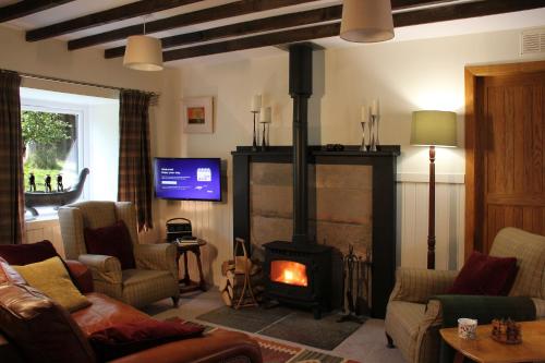 Smithy Cottage — 4-Star Luxury Hotel in None, United Kingdom