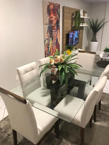 Apartamento á 30 metros praia com vista mar.