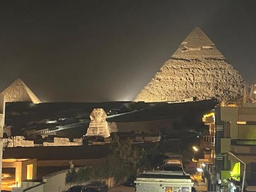 Sphinx palace pyramids view inn