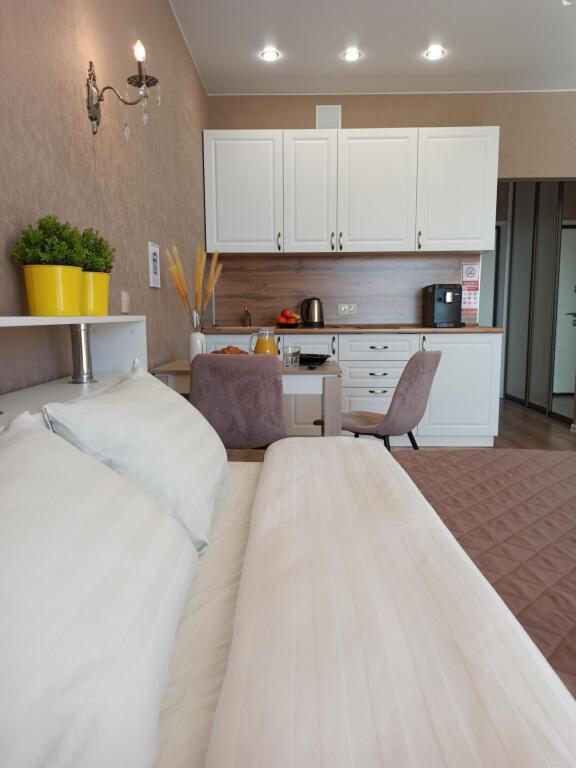 A red Cat on the street 2nd Lugovaya 24 building 1 in Tyumen, Russia