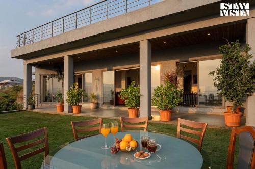 Aarna House by StayVista Mountain & lakeview villa Contemporary modern interiors & a charming terrace garden — 4-Star Luxury Hotel in Pune, India