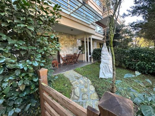 Seaside Apartment with a Private Garden