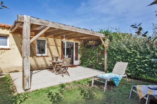 Amarylis à Calvi location 2 pers avec clim jardin piscine et barbecue in Calvi, France