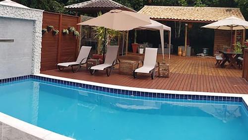 Casa com piscina e churrasqueira em Massaguaçu SP — 4-Star Luxury Hotel in Caraguatatuba, Brasil