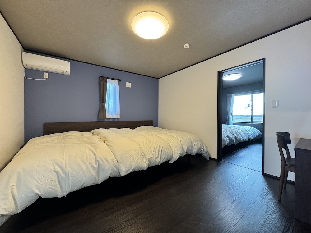 Windmill Village E 10 - carbon neutral hotel in Takashima
