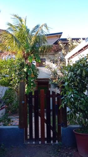 Quarto com banho privado e lavanderia - carbon neutral hotel in Florianopolis