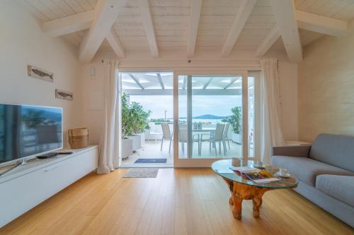 Acqualife Attico 7 — 4-Star Luxury Hotel in Cannigione, Italy