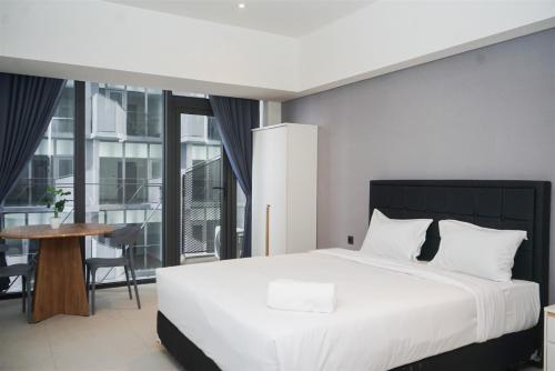 Cozy Stay Studio Apartment for 4 Persons at Carstensz Residence By Travelio — 4-Star Luxury Hotel in Tangerang, Indonesia