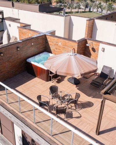 Duplex com Jacuzzi em Riviera in Bertioga, Brasil