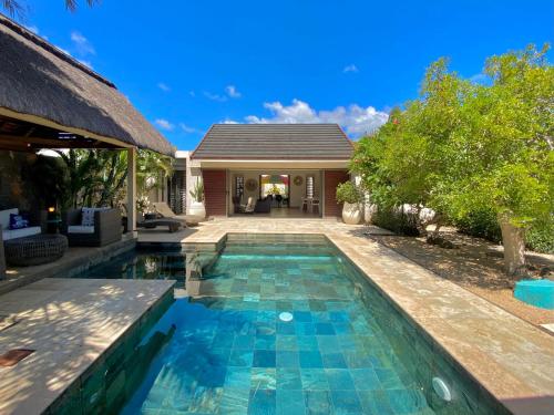 Large villa with private pool and tropical garden — 4-Star Luxury Hotel in Grand Baie, Mauritius