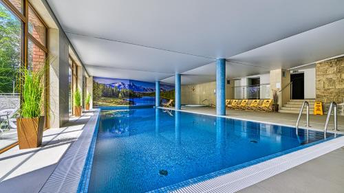 Apartament Widokowy Rocca View Stone Hill Resort Z Basenem I Saunami in Szklarska Poreba, Poland