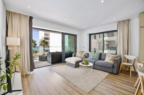Bright Modern Beachside Apartment with Pool & Seaview — 4-Star Luxury Hotel in Quarteira, Portugal