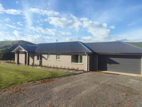 The Farmhouse — 4-Star Luxury Hotel in Cambridge, New Zealand