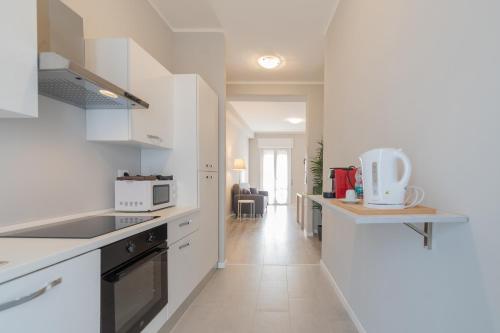 Trilocale Ospedale Civile 7 _ F&L Apartment — 4-Star Luxury Hotel in Brescia, Italy