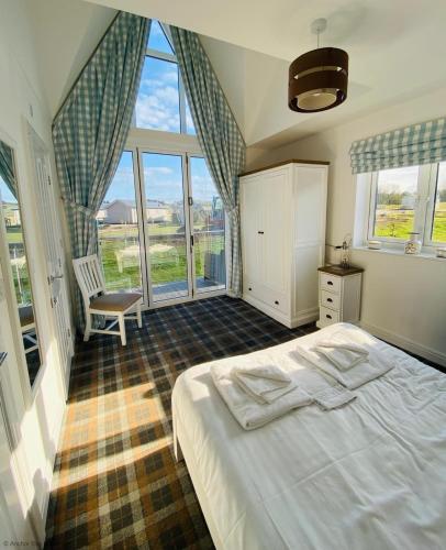 Pearl & Spice Hideaways 2 two bedroom cottages nearby Part of the The Bay Filey Holiday Village with pool gym and direct beach access pub restaurant tennis and meadows walks