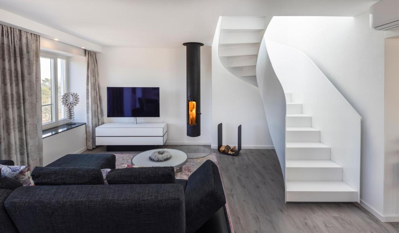 Penthouse mit Kamin Dachterrasse Meerblick Gasgrill Klimaanlage Luxus Design Apartment 2 Minuten zum Strand — 4-Star Luxury Hotel in Ostseebad Binz, Germany
