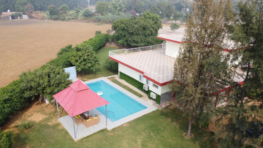 Alaya Stays 4BHK Farmhouse with Pvt Pool & Garden Manesar — 4-Star Luxury Hotel in Gurgaon, India