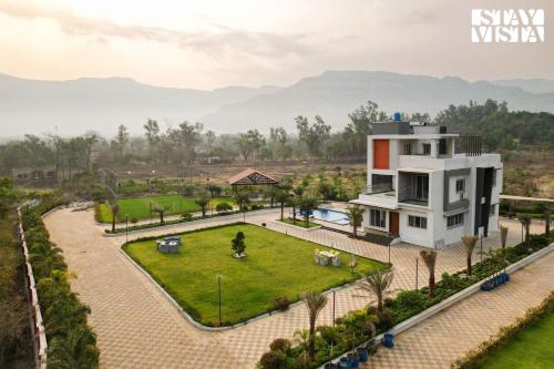 StayVista's Oasis Of Solace Mountain View Villa with Pool Deck Kids Zone Turf & Gazebo — 4-Star Luxury Hotel in Karjat, India
