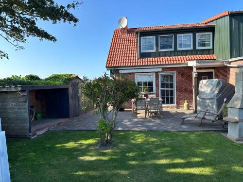 Huus ant Diek Ferienhaus mit Maisonette Wohnung in Deichnähe Nähe Norddeich in Norden, Germany