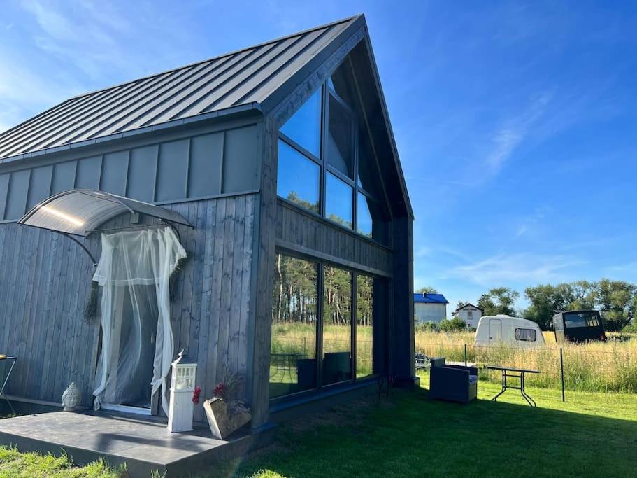 Ferienhaus Blaues Wunder am Wasser mit Grill — hotel in Nowe Warpno