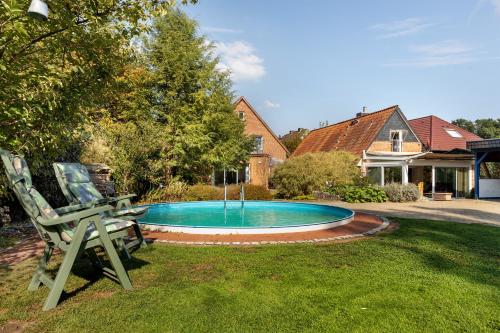 Ferienhaus In Oerrel Mit Pool — hotel in Fassberg