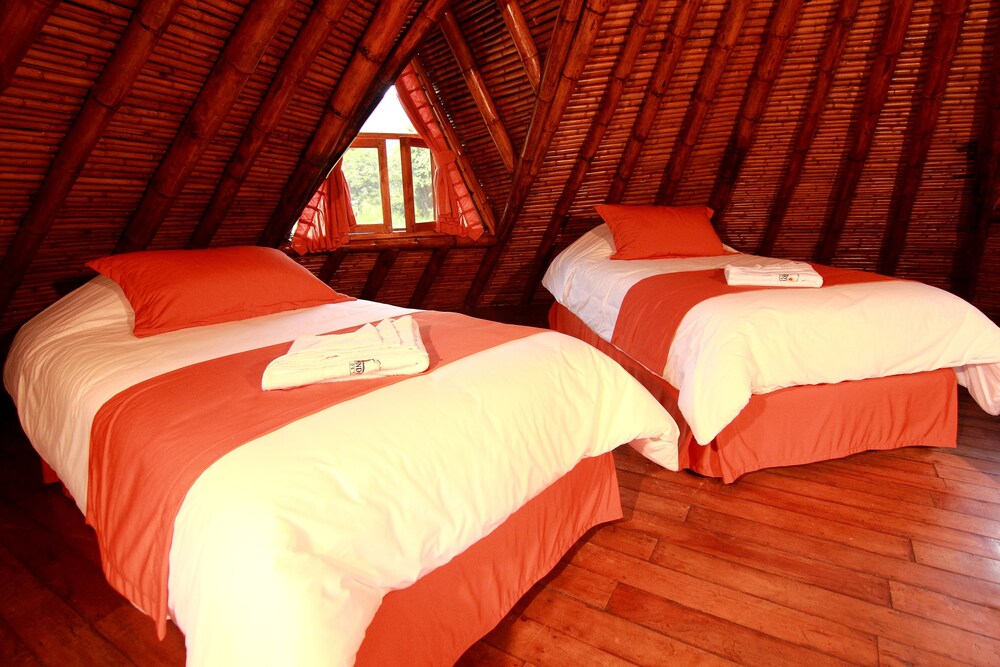 Mindo Río Hostería - carbon neutral hotel in Unknown City