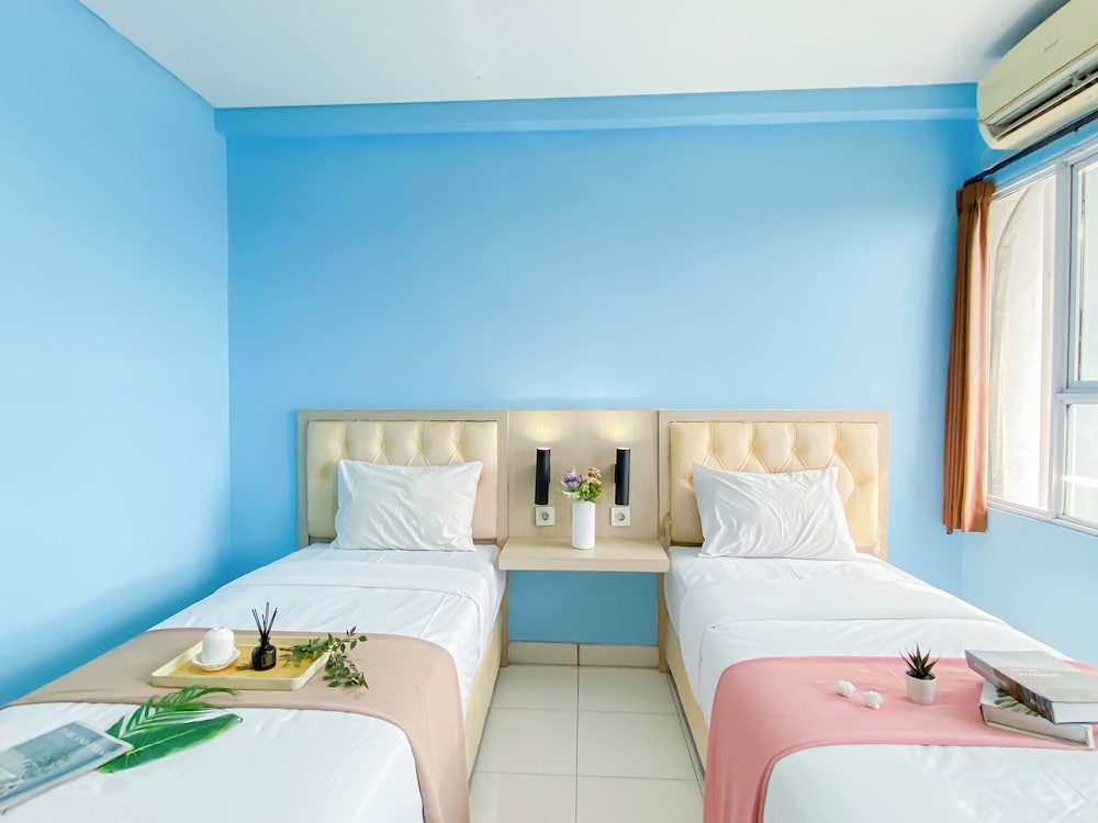 Simple Blue Toned Studio At Elvis Tower Apartment in Cikarang, Indonesia