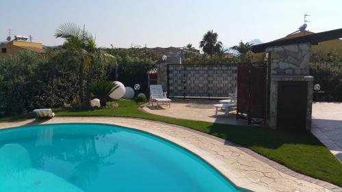 Ville Tiffany in Campofelice Di Roccella, Italy