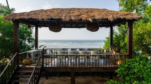 SaffronStays Stella Maris Beach House 5BR pet friendly beachfront estate with yoga pavilion luxury tents & private Redi Beach access — 4-Star Luxury Hotel in Arambol, India