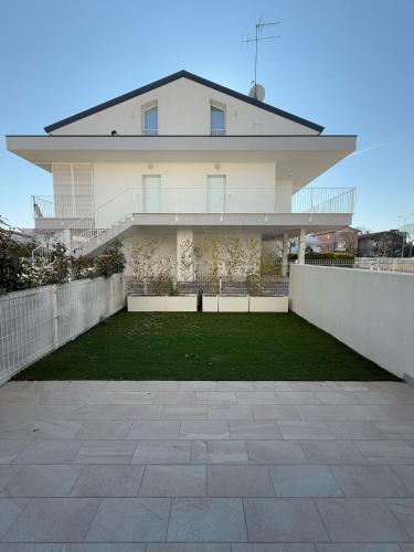 Green Apartment Solo Per Famiglie Walterigato Apartments — 4-Star Luxury Hotel in Lido Di Jesolo, Italy