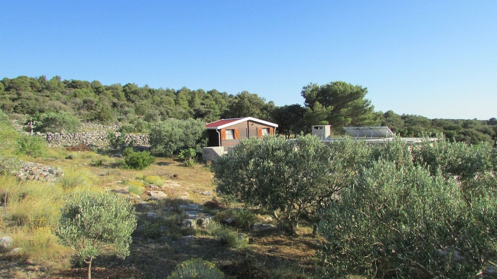 Secluded house with a parking space Cove Mikavica Zirje 22367 — 4-Star Luxury Hotel in Sibenik, Croatia