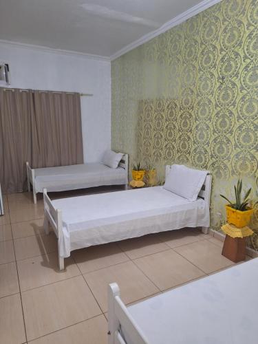 Quarto triplo com banheiro compartilhado in Manaus, Brasil