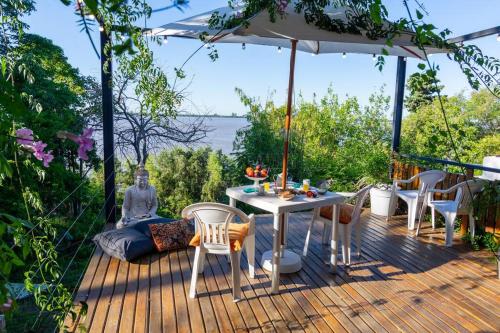 Hermosa casa terraza al río Jacuzzi climatizado — 4-Star Luxury Hotel in Parana, Argentina