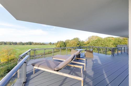 Strandlounge 5 Sterne Wohnung mit XXL Balkon Wellness & Boddenblick — 4-Star Luxury Hotel in Wustrow, Germany