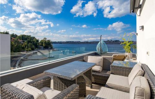 2 Bedroom Lovely Apartment In Omisalj — 4-Star Luxury Hotel in Omisalj, Croatia