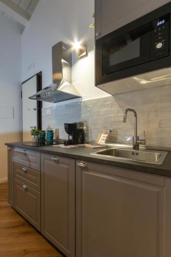 Cortile Del Greco Apartments — 4-Star Luxury Hotel in Palermo, Italy
