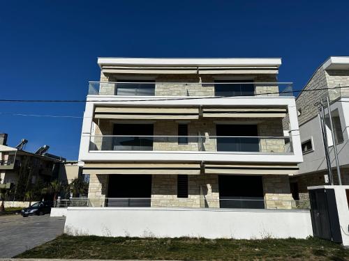 White Pearl Apartment — 4-Star Luxury Hotel in Nea Flogita, Greece