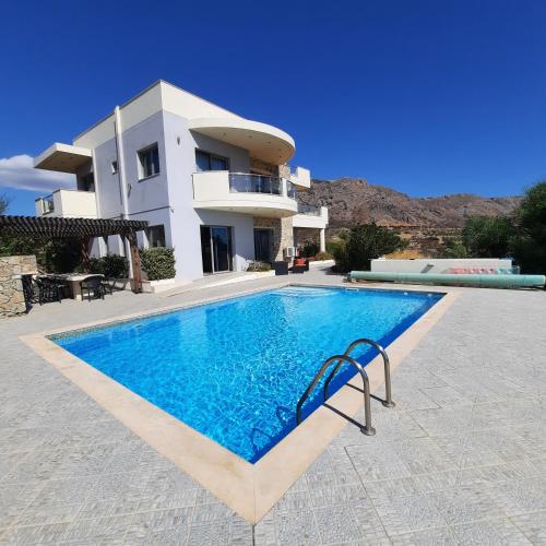 Villa Danae — 4-Star Luxury Hotel in None, Greece