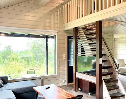 Hietavilla Pläk Hot tube Sauna Fireplace 11kW EV refuel Landscape view Silence Free WiFi in Unknown City, Finland