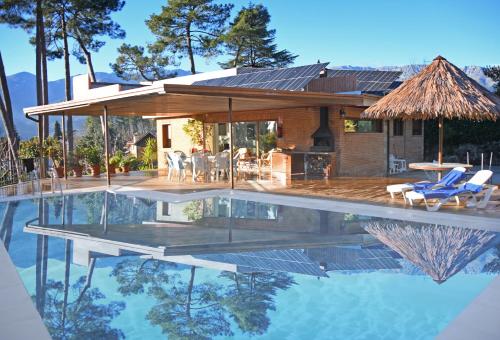 Anemos Cave Suites - carbon neutral hotel in Fira