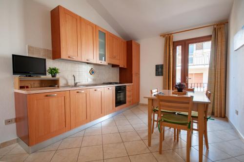 Appartamento Fabio Caletta sul mare in La Caletta, Italy