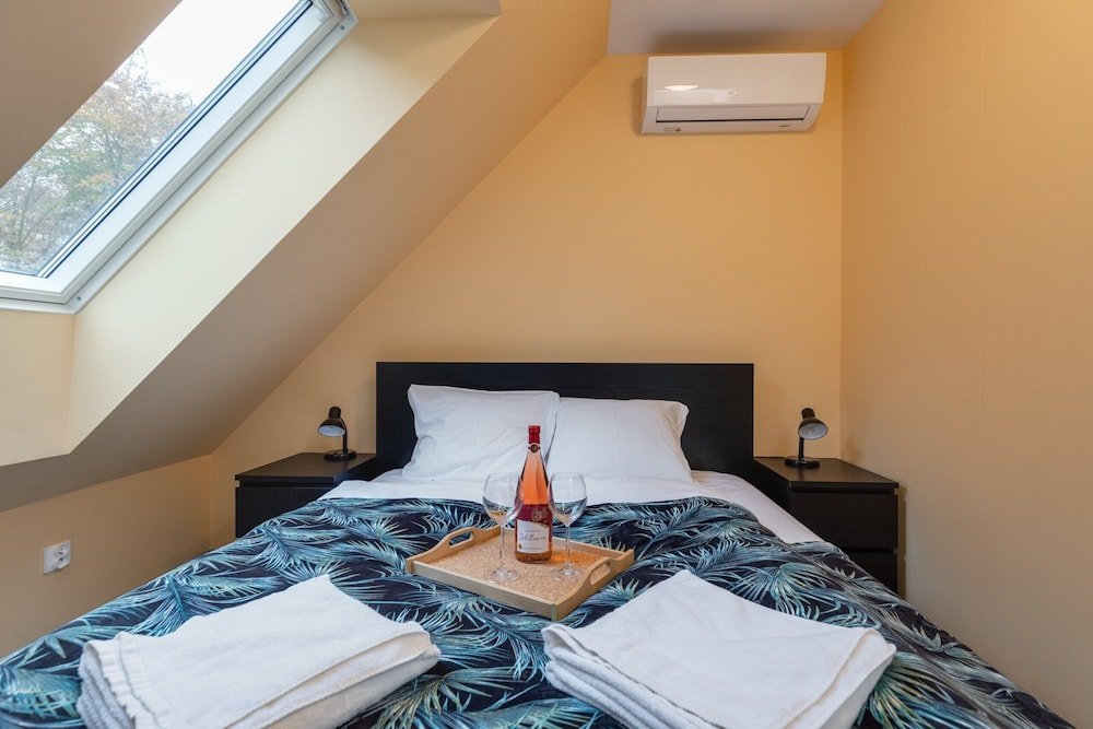 Dom OSTOYA Wrzosowo Ogród Plac Zabaw & Klimatyzacja by Noclegi Renters — 4-Star Luxury Hotel in Kamien Pomorski, Poland