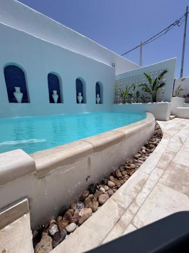 The Greek Village Paros By Seahorse in Unknown City, Jordan