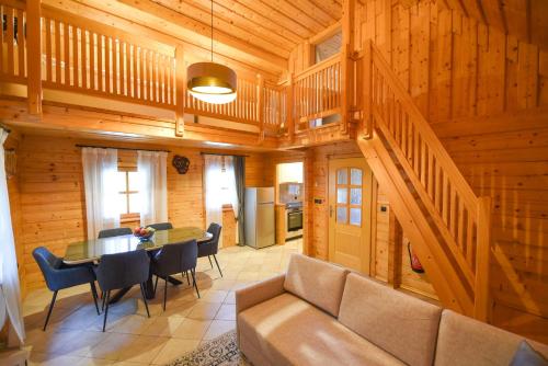Wooden Cottage Baznik with Hot Tub — 4-Star Luxury Hotel in Brezice, Slovenia