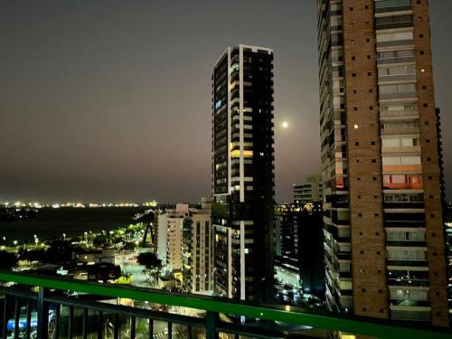 Apart Hotel quarto e sala mobiliado na Enseada do Sua in Vitoria, Brasil