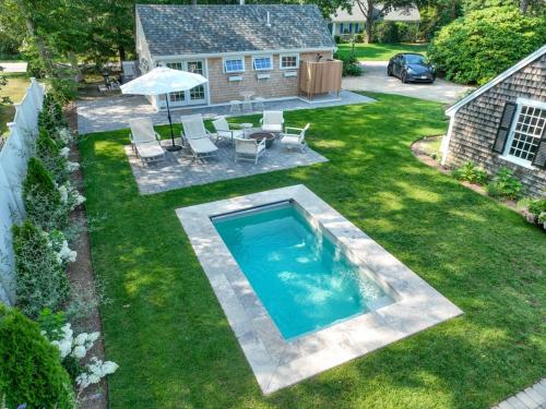 Swing Set Plunge pool and large yard await in Barnstable, United States
