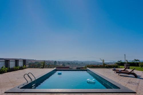 Breezy Whispers by StayVista Private infinity pool Stunning mountain views Spacious swimming pool Deck & Lawn in Igatpuri, India