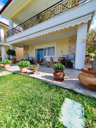 Мила — 4-Star Luxury Hotel in Pefkochori, Greece