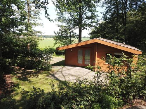 Houten huisje 7 voor Rust Ruimte en Natuur — hotel in Neede