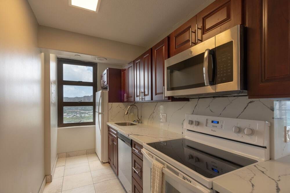 Newly Remodeled Corner Unit at the Waikiki Banyan with Diamond Head Views - photo 10